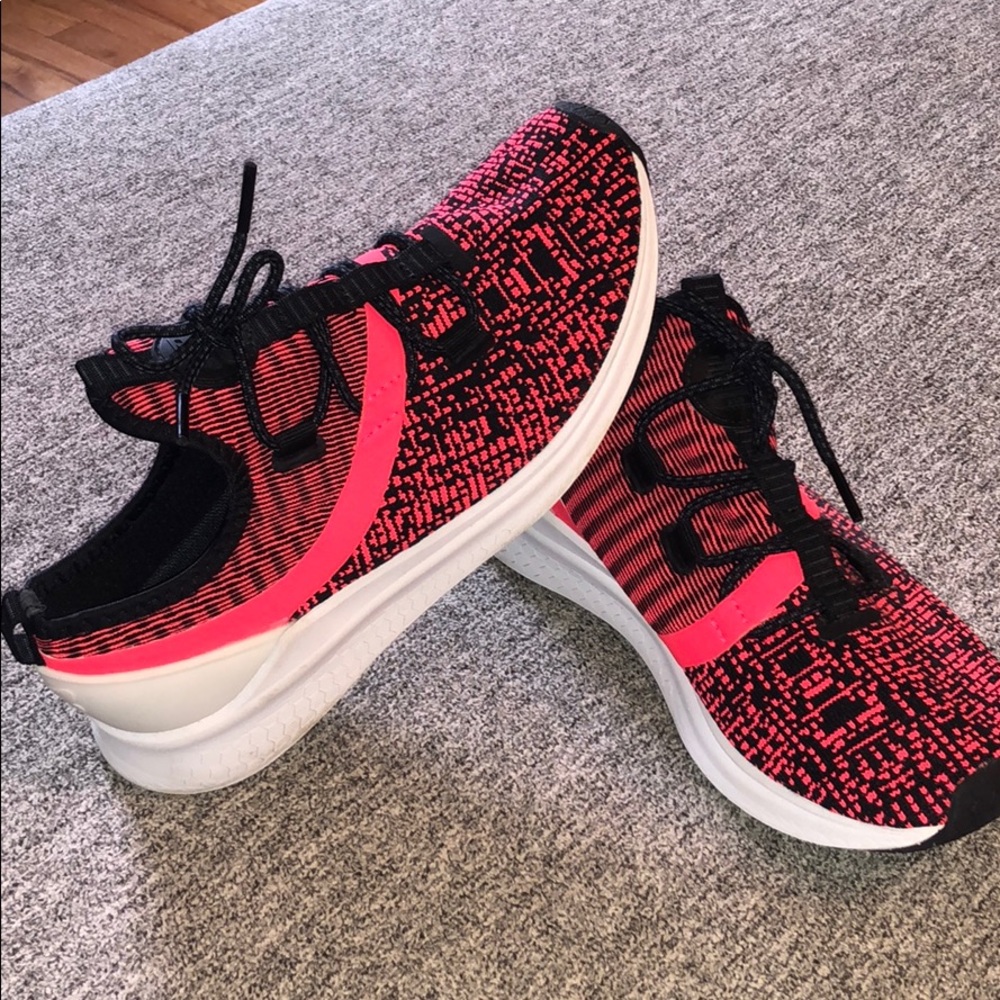 New Balance pink and black Fresh Foam Lazr